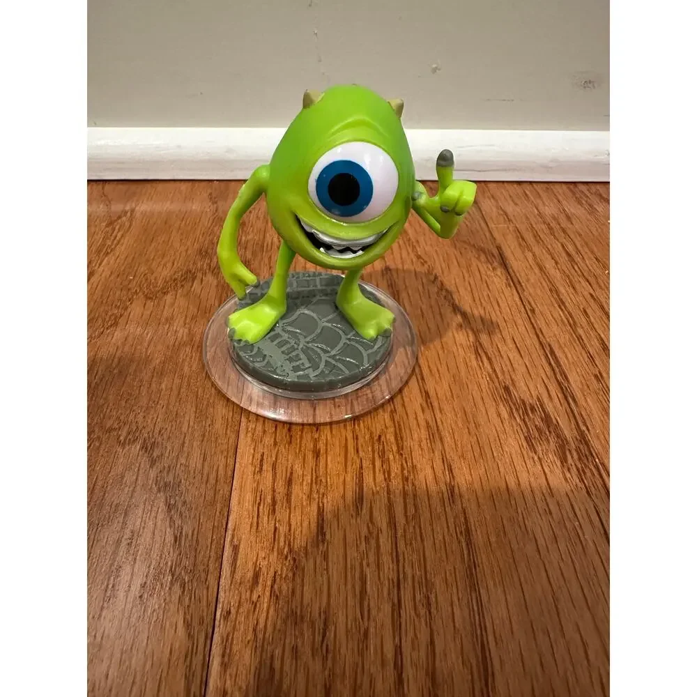 Disney Infinity figures Jack Sparrow, Monsters Inc, and Wreck it Ralph